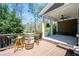 Outdoor deck featuring a custom barrel table and chairs for entertainment at 2434 Soft Maple St, Atlanta, GA 30360