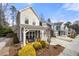 View of multiple similar homes on a street with manicured lawns and driveways leading to attached garages at 2434 Soft Maple St, Atlanta, GA 30360