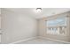 Bedroom with neutral carpet and bright natural light at 5392 Fox Creek Ln, Norcross, GA 30071