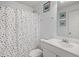 Cozy bathroom featuring a white vanity, neutral walls, and framed art at 1893 Tulip Petal Rd, Auburn, GA 30011