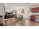 Open concept living area with kitchen, dining area and comfortable living room at 1893 Tulip Petal Rd, Auburn, GA 30011