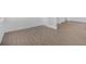 Bright living room featuring wood floors, white walls and trim, and a glass-paned door at 6055 Misty Hill Ln, Buford, GA 30518