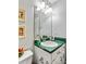 Updated bathroom featuring vanity with green marble, new lighting, and ample mirror space at 13 Greystone Nw Ln, Cartersville, GA 30121