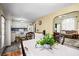 Inviting dining room showcasing an open floor plan into the kitchen and a comfortable living area at 13 Greystone Nw Ln, Cartersville, GA 30121