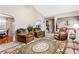 Comfortable living room featuring hardwood floors, vaulted ceilings, and plush seating at 13 Greystone Nw Ln, Cartersville, GA 30121