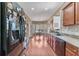 Charming kitchen featuring stainless steel appliances and eat-in breakfast nook with bay windows at 134 Paces Lakes Overlook, Dallas, GA 30157