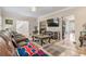 Open living room showcasing the inviting decor and a seamless flow to the kitchen space at 134 Paces Lakes Overlook, Dallas, GA 30157