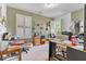 Spacious home office with shuttered windows, carpet, and a variety of furniture at 134 Paces Lakes Overlook, Dallas, GA 30157