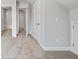 Cozy bedroom with neutral carpet, leading to the en suite bathroom at 306 Bunker Hill Ct, Acworth, GA 30102