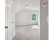 Neutral bedroom featuring a plush carpet and a bright window at 306 Bunker Hill Ct, Acworth, GA 30102