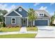 Inviting exterior showcasing a well-manicured lawn, attractive siding, and a welcoming entrance to the beautiful home at 306 Bunker Hill Ct, Acworth, GA 30102