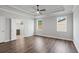 Spacious main bedroom with tray ceiling, fan, natural light and an ensuite bathroom at 306 Bunker Hill Ct, Acworth, GA 30102