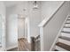 Elegant stairway with hardwood steps and white risers and white banister at 306 Bunker Hill Ct, Acworth, GA 30102