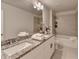 Bathroom with double vanity, granite counters, and tiled shower/tub at 3328 Sir Gregory Mnr, Lawrenceville, GA 30044