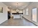 Gourmet kitchen featuring stainless steel appliances, granite countertops, and a spacious island at 3328 Sir Gregory Mnr, Lawrenceville, GA 30044