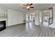 Spacious living room boasts hardwood floors, a fireplace, and an open floor plan at 3328 Sir Gregory Mnr, Lawrenceville, GA 30044