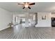 Open floor plan features hardwood floors, ample natural light, and inviting spaces at 3328 Sir Gregory Mnr, Lawrenceville, GA 30044