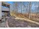 The home features a backyard with a patio, deck, and walkway leading to the home at 83 Southshore Ln, Dallas, GA 30157