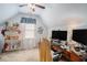 Office with desk, monitors, shelf and window with blinds offering bright light at 83 Southshore Ln, Dallas, GA 30157