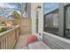 Outdoor balcony featuring wooden floors, seating, and natural light at 2435 Folly Se Ln, Atlanta, GA 30339