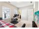 Bedroom with trundle bed features a desk and a flat screen TV at 2435 Folly Se Ln, Atlanta, GA 30339