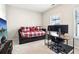 Bedroom with trundle bed features a desk and a flat screen TV at 2435 Folly Se Ln, Atlanta, GA 30339