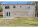 Exterior back of home features a patio, french doors, siding, and a grassy yard at 3875 Mcgill Way, Decatur, GA 30034