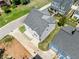 Aerial view of new home construction surrounded by mature trees at 648 Liella Se Park, Atlanta, GA 30312