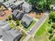 Bird's eye view of new home construction with a driveway and landscaped yard at 648 Liella Se Park, Atlanta, GA 30312