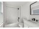 Modern bathroom with white subway tile, black hardware, and sleek vanity at 648 Liella Se Park, Atlanta, GA 30312