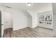 Bedroom featuring modern gray flooring, built-in storage, and a view at 648 Liella Se Park, Atlanta, GA 30312