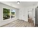 Bedroom with large window and a view of the neighborhood; modern interior at 648 Liella Se Park, Atlanta, GA 30312