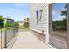 Side door with brick base and metal railing at 648 Liella Se Park, Atlanta, GA 30312