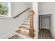 Staircase with wooden handrail and newel post at 648 Liella Se Park, Atlanta, GA 30312