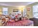 Cozy sitting area with comfortable seating, natural light, and a decorative rug at 7440 Princeton Trce, Sandy Springs, GA 30328