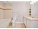 Bright bathroom featuring a shower and bathtub combo, toilet, and vanity with ample counter space at 1101 Juniper Ne St # 722, Atlanta, GA 30309
