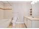 Bright bathroom features a tiled shower-tub combo and a vanity with storage at 1101 Juniper Ne St # 722, Atlanta, GA 30309