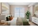 Relaxing bedroom featuring a queen bed, ample natural light, and stylish decor at 1101 Juniper Ne St # 722, Atlanta, GA 30309