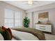Inviting bedroom with natural light, dresser, and closet at 1101 Juniper Ne St # 722, Atlanta, GA 30309