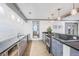 Modern kitchenette with sleek countertops, stainless steel appliances at 1101 Juniper Ne St # 722, Atlanta, GA 30309