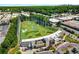 Aerial view of a driving range near the community, featuring multiple greens and a modern building at 1658 Duncan Nw Dr, Atlanta, GA 30318