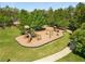 Community playground with slide, monkey bars, and wood chip safety surface for recreation at 1658 Duncan Nw Dr, Atlanta, GA 30318