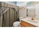 Bathroom features a combination shower and bathtub, and single sink at 340 Ruby Forest Pkwy, Suwanee, GA 30024