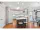 Charming kitchen with a central island and stainless steel appliances at 340 Ruby Forest Pkwy, Suwanee, GA 30024