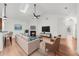 Inviting living room featuring a fireplace, skylight, and an open layout at 404 Paperbark Ct, Acworth, GA 30102