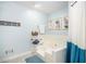 Bathroom features tub, neutral walls and decor at 345 Wedgefield Dr, Mcdonough, GA 30252