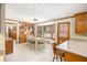 Spacious kitchen and dining area featuring wood cabinets and a cozy bay window with natural light at 345 Wedgefield Dr, Mcdonough, GA 30252
