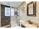 Modern bathroom features glass block window and tiled walk-in shower at 3701 W County Line Rd, Douglasville, GA 30135