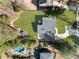 Expansive backyard features an in-ground pool, and a beautiful stone patio and pathway at 4217 Paces Ferry Se Rd, Atlanta, GA 30339