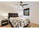 Bright bedroom with a modern bed, stylish lighting, and hardwood floors at 4217 Paces Ferry Se Rd, Atlanta, GA 30339